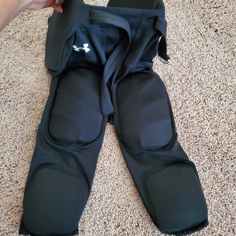 Under Armour football integrated pants.